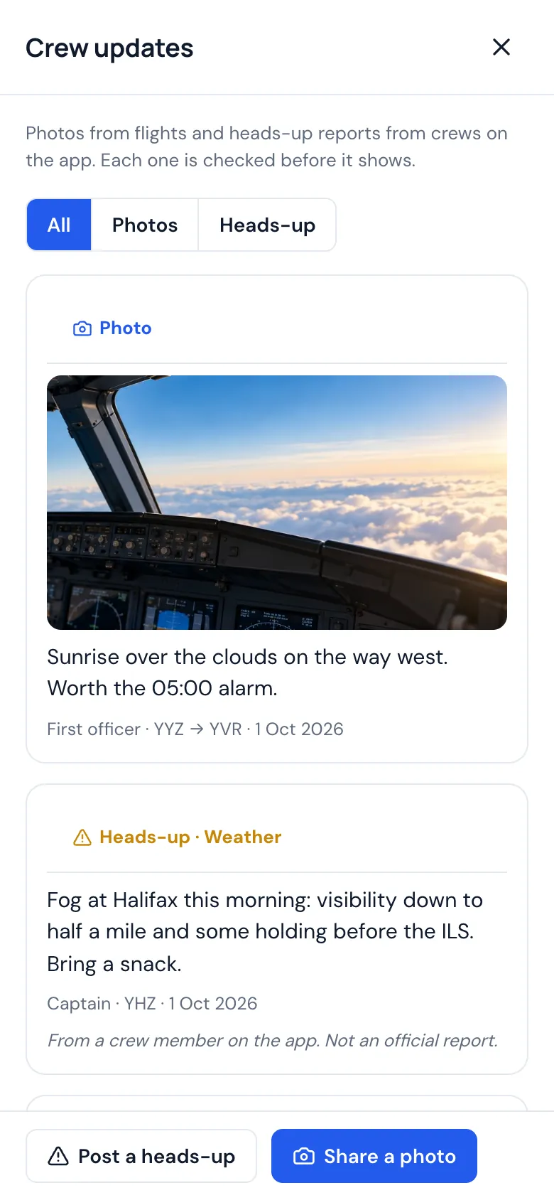 Crew updates on a phone: a photo from the flight deck and a heads-up about fog
